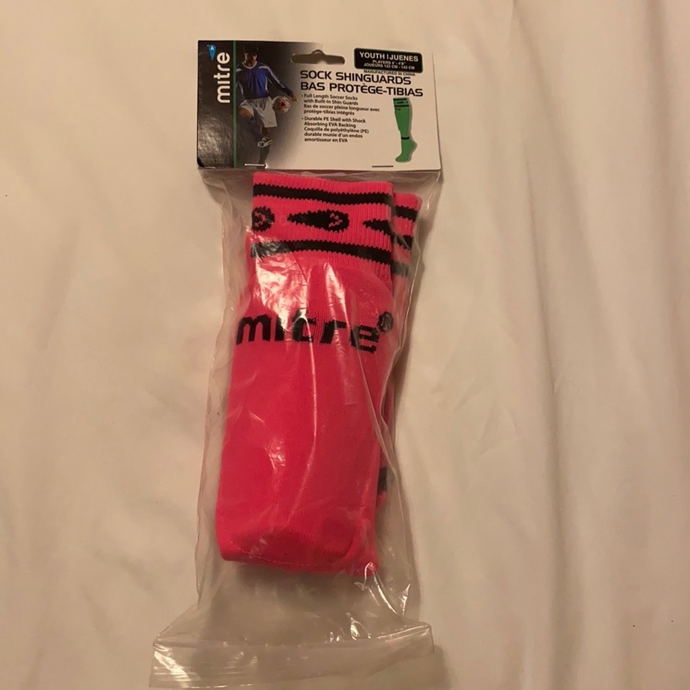 Brand new mitre shinguard socks.